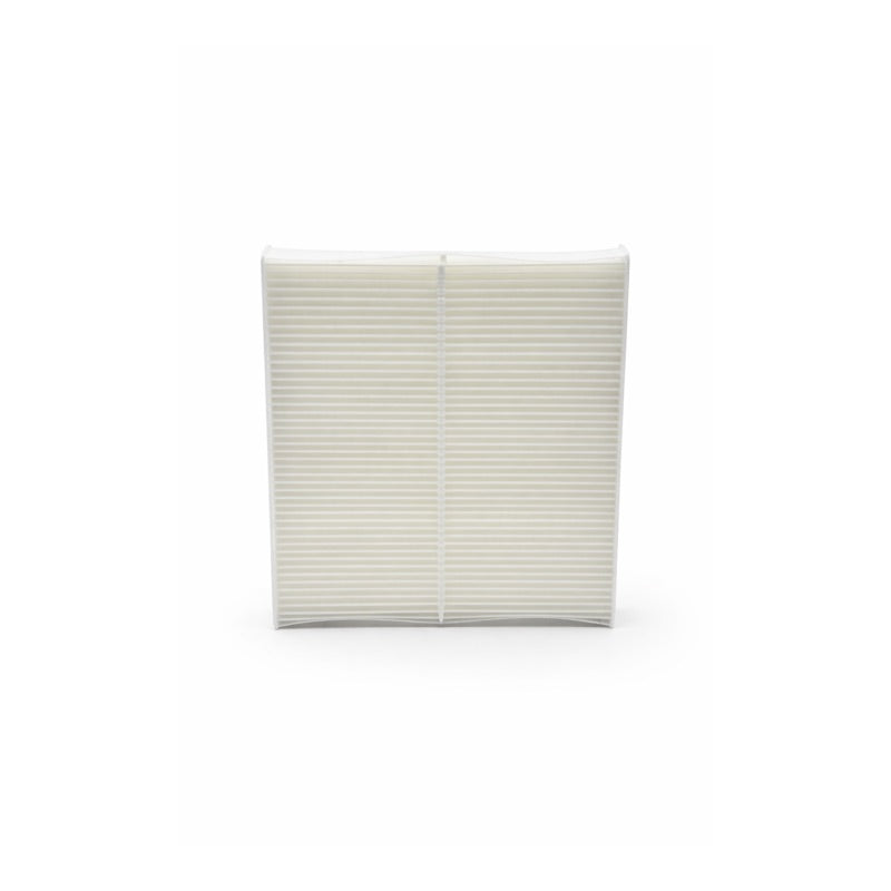 Rectangular white cabin air filter on a white background